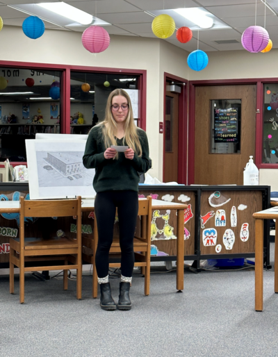 student presenting to school board